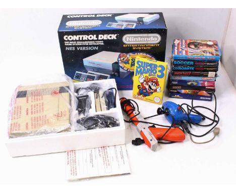 A Nintendo Entertainment System NES set, comprising of the console, two control pads, start lead, and Super Mario 3 Brothers 