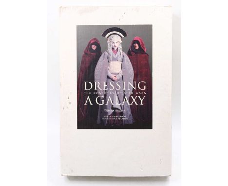 Dressing a Galaxy "The Costumes of Star Wars" by Trisha Biggar, complete in the original white ground and labelled box, with 