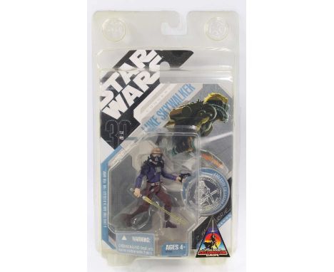 A Star Wars Celebration of Europe Hasbro Luke Skywalker concept art action figure with collectable coin from the R McQuarrie 