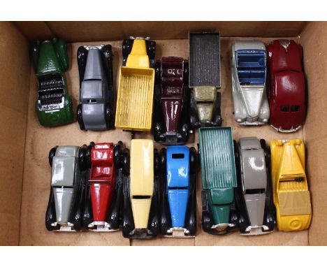 A Dinky Toys group of 14 loose diecast to include No. 25F gardener's lorry in a yellow body with matching rigid hubs, No. 36B