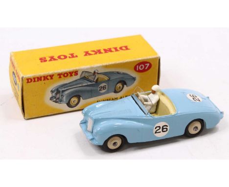 Dinky Toys, 107 Sunbeam Alpine Sports, pale blue body with cream interior and cream rigid hubs, white driver with windscreen,