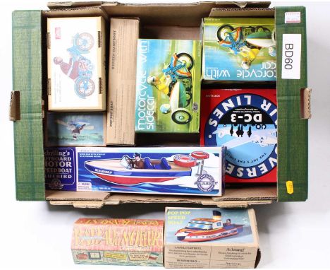 A tray containing a quantity of boxed tinplate mostly reproductional various examples to include; Welby Pop Speed Boat, Schyl