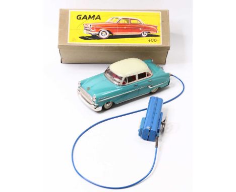 Gama No.400 tinplate and battery-operated model of an Opel Kapitan saloon, comprising turquoise body with cream roof and deta
