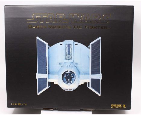 A Code 3 Collectibles Star Wars The Official Diecast Replica of Darth Vader's Tie Fighter from Episode 4 A New Hope, on stand