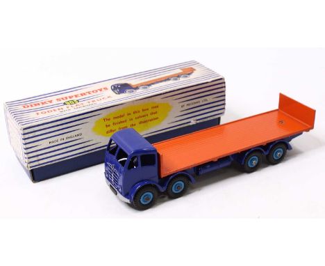 Dinky Toys No. 903 Foden flat truck with tailboard comprising of 2nd type dark blue cab and chassis with dark orange back and