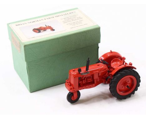 A Brian Norman farm miniatures 1/32 scale white metal and resin model of a Nuffield Universal Perkins single wheel row crop d