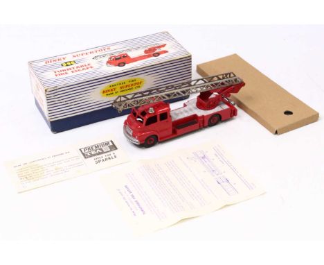 Dinky Toys No. 956 turntable fire escape engine with windows comprising red and silver body with red plastic hubs with chrome