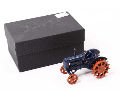 Britains Farm No. 127F Fordson Major tractor in blue, with orange spudded metal wheels, model with a crack to the base and so