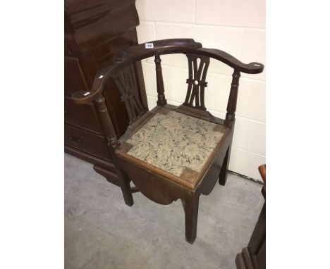 A Victorian oak corner chair commode