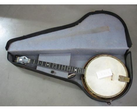A vintage Jetel banjo in case