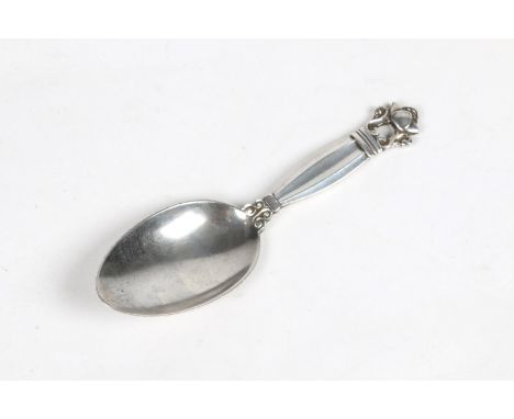 A GEORG JENSEN AND WENDEL SILVER ACORN PATTERN CADDY SPOON, 10cm long