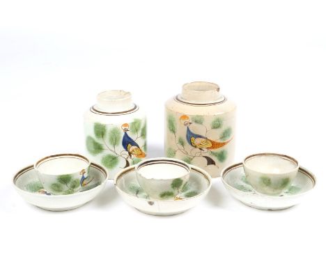 A 19TH CENTURY PEARLWARE PART TEA SET comprising two tea caddies of cylindrical form and three tea bowls and saucers, each pa