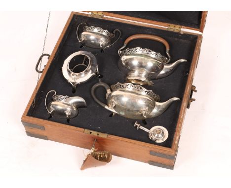 A HAMILTON & CO (CALCUTTA) SILVER FOUR PIECE TEA SERVICE consisting of a teapot, tea kettle on stand with burner, milk jug an