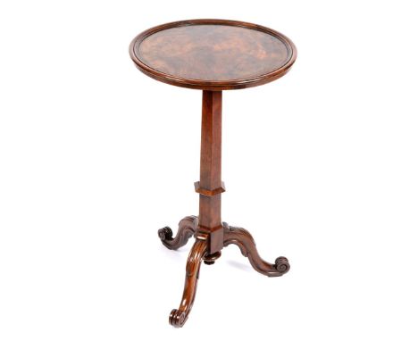 A VICTORIAN CIRCULAR ROSEWOOD OCCASIONAL TABLE with dished top above hexagonal column and scroll carved tripod, the underside