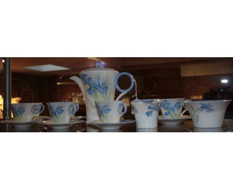 A SHELLEY BLUE IRIS PATTERN COFFEE SET comprising coffee pot and cover, six cups, six saucers, cream jug and sugar bowl, reta