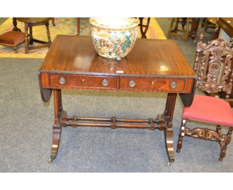 A Regency reproduction mahogany sofa table