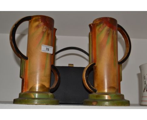 A pair of Art Deco ceramic vases, painted with a sunburst pattern; a 1920s lady's handbag