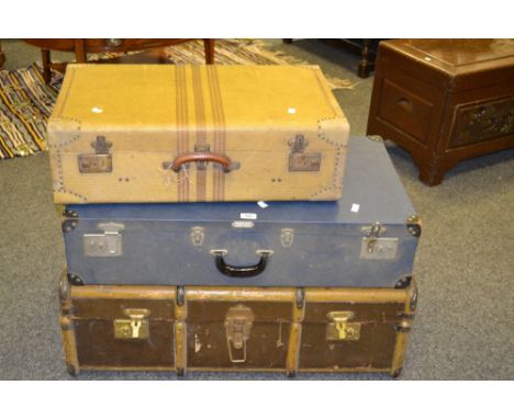 Luggage - a 20th century leather travelling trunk with leather handles, a mid 20th Century suitcase c1950, a 20th Century sui