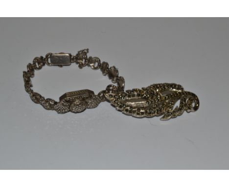 A lady's Art Deco marcasite watch strap and watch face cover; a marcasite leaf brooch (2)