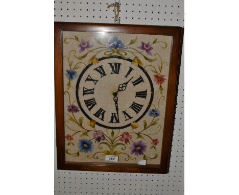 An unusual George V wall clock, the face embroidered with flowers