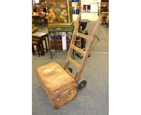 An early 20th century  sack barrow, metal trunk