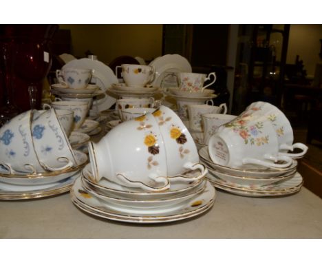 Ceramics- a Royal Kendal floral transfer printed six setting tea service;  a Royal Osbourne tea service; another Royal Staffo