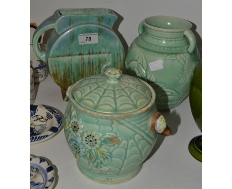 An Art Deco Beswick jug; a Crown Devon celadon vase, an Arthur Wood celadon glazed biscuit barrel (3)