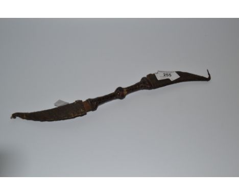 Tribal art : a twin bladed hunting knife, the blades held within worked covers