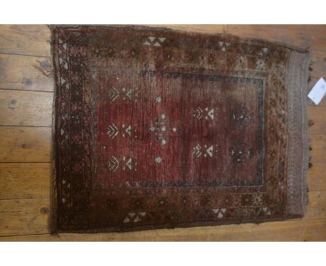 A Kurdish camel bag with stylised floral central panel and floral border, 90cm x 66cm