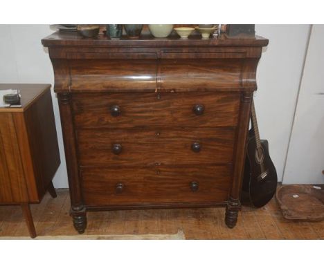 A 19thc mahogany scotch chest, the plain rectangular top with two plain curved fronted frieze drawers above three long drawer