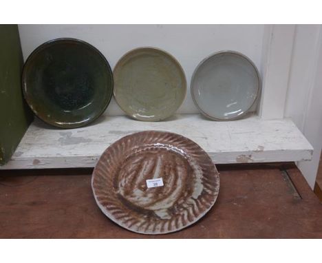 Carolina M. Valvona, a group of four studio pottery plates (4)