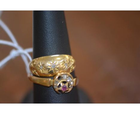 An 18ct gold gypsy ring, 3.6g; together with a yellow metal ring decorated with stone set crescent moon marked 18ct, 3.1g (2)