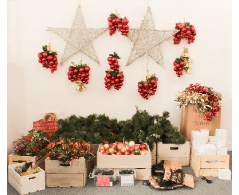 A large quantity of Christmas decorations - including strings of LED lights, a light-up silver twig star, baubles, green garl