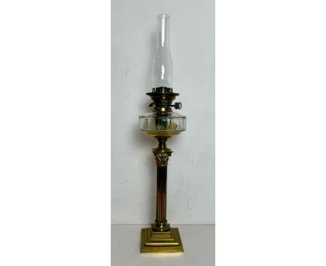 A brass Corinthian column and cut glass oil lamp - with Duplex No.2 burner and chimney, 76cm high overall.