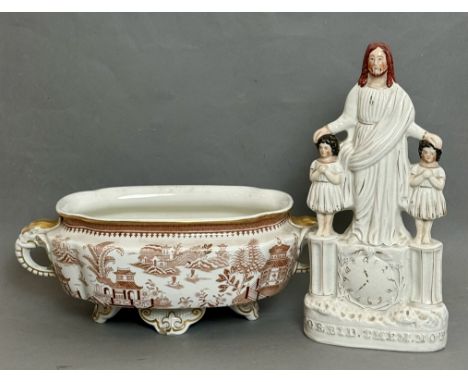 Two pieces of 19th century English china, comprising - 1. A Staffordshire pearlware flatback figure of Christ standing with t