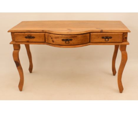 A 19th century style pine break bowfront side-table or dressing-table - the moulded top over a central bowfront drawer flanke