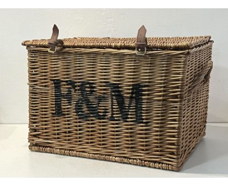 A Fortnum &amp; Mason wicker hamper - with end handles and painted 'F&amp;M' script to front, leather straps, 59 x 41 x 40cm.