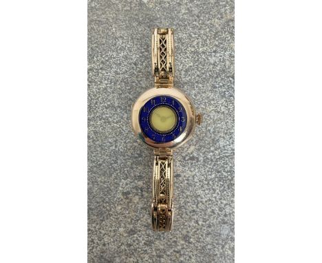 A pre-war 9ct gold and enamel ladies half-hunter style wrist watch - London import marks, 1920, Swiss manual wind movement, m