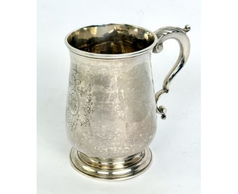 A George III silver pint mug - Thomas Wallis I,&nbsp;London 1780, ovoid form with foliate capped joined-scroll handle and ste