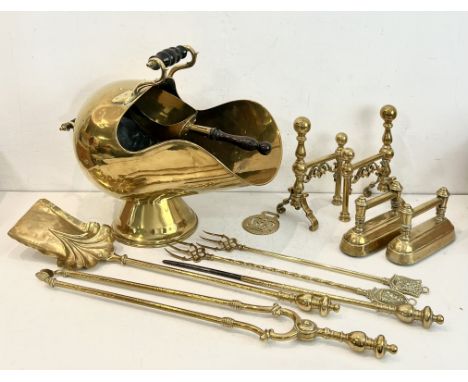 A collection of Victorian brass fireside items - including a good quality helmet shaped coal scuttle with shovel, 41.5cm high