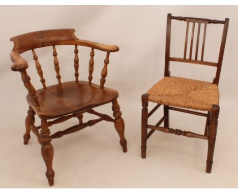 Two 19th century chair, comprising - 1. A beech, walnut and elm captain's or smoker's bow armchair - with turned baluster spi