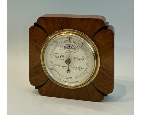 An Art Deco walnut and ebonised aneroid barometer - by Short &amp; Mason of London, of quatrefoil form, with signed 4&frac34;