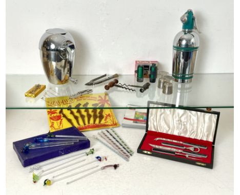 A small collection of vintage and modern cocktail accessories and equipment - including a 1960s chrome and green Sparklets so