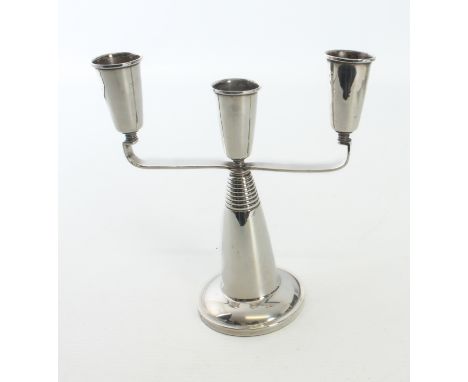 A silver candelabra in the modernist manner by David Lawrence, hallmarked Birmingham 1963.  