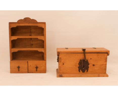 An iron bound pine box and a hanging wall shelf - the rectangular box with iron strap hinges, decorative iron lock plate and 