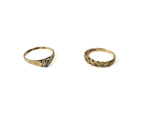 Two 9ct yellow gold stone-set rings - both UK hallmarked, comprising a seven stone half eternity ring and a single stone ring