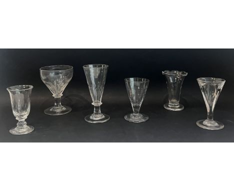 Six 19th century drinking glasses - comprising a late-Georgian rummer with petal moulded ogee bowl, capstan stem and plain fo