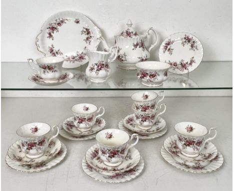 A Royal Albert 'Lavender Rose' pattern tea service - for six persons, comprising teapot (the cover a/f); cream jug, sugar bow