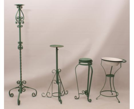 Four French wrought iron tripod stands, early 20th century, later green painted, to include - 1. a washstand with enamel bowl