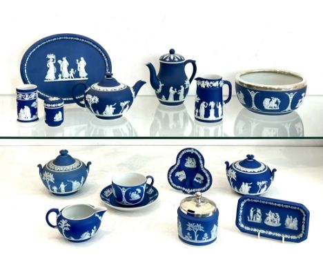 A small collection of Wedgwood dark blue jasper ware - 19th and first half 20th century, the 19th century pieces comprising a